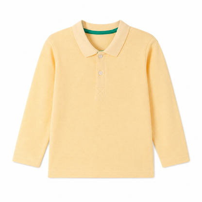 Front flat lay of the butter yellow kids long sleeve polo shirt.