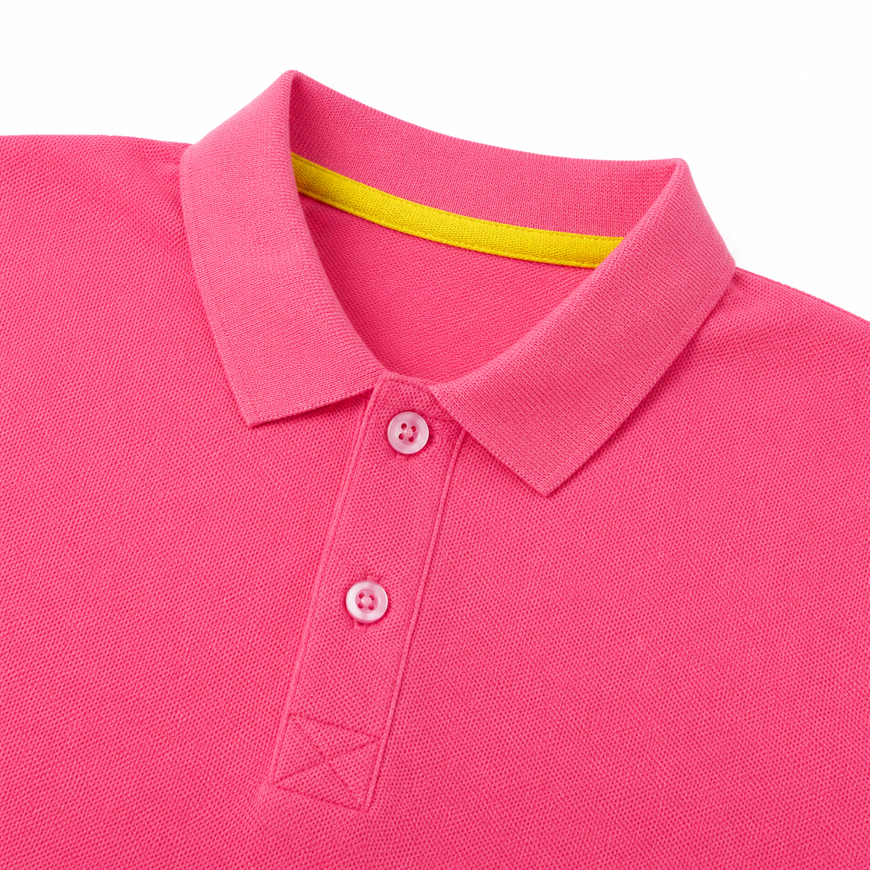 Close-up of the collar and button placket construction on the hot pink long sleeve polo.