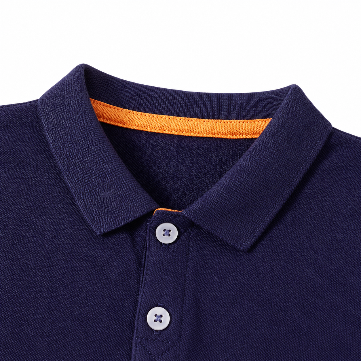 Close-up of the polo collar and two-button placket on the navy kids shirt.