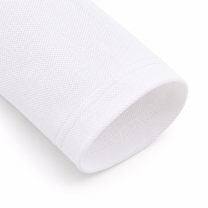 Close-up of the long sleeve and cotton-blend fabric on the white kids polo.