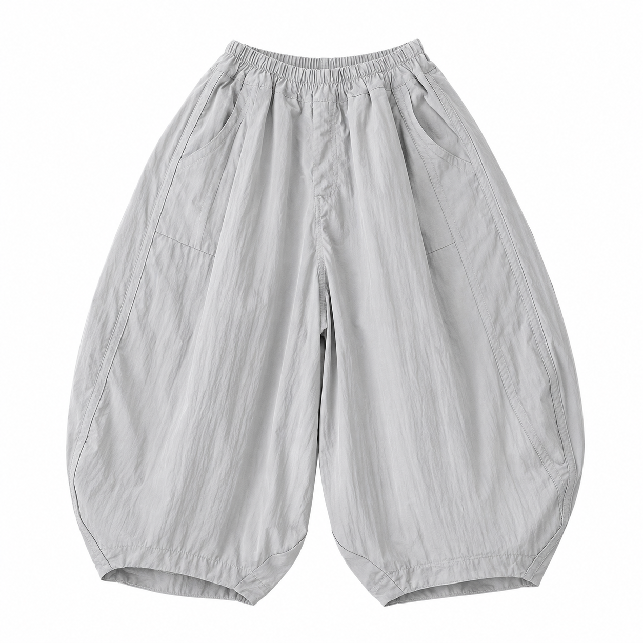 Front flat lay of light gray unisex kids balloon pants with a relaxed curved-leg shape.