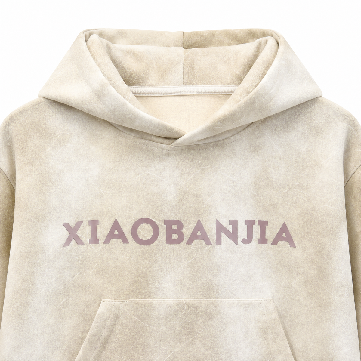 Close-up of the chest graphic detail on the cream kids pullover hoodie.