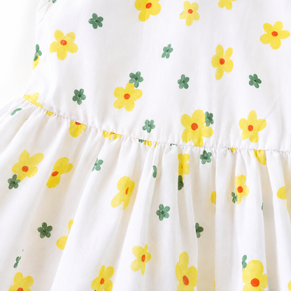 Close-up of the gathered waist and yellow floral print.