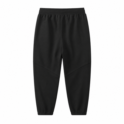 Back flat lay of the black kids jogger pants with elastic waistband and cuffs.