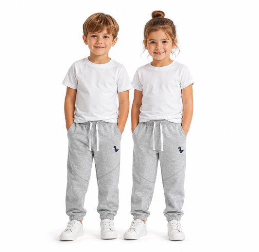 Girl and boy models wearing the light gray unisex kids cotton jogger pants.