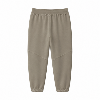 Back flat lay of the taupe kids jogger pants with elastic waistband and cuffs.