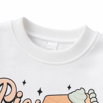 Close up detail of girls graphic long sleeve cotton top
