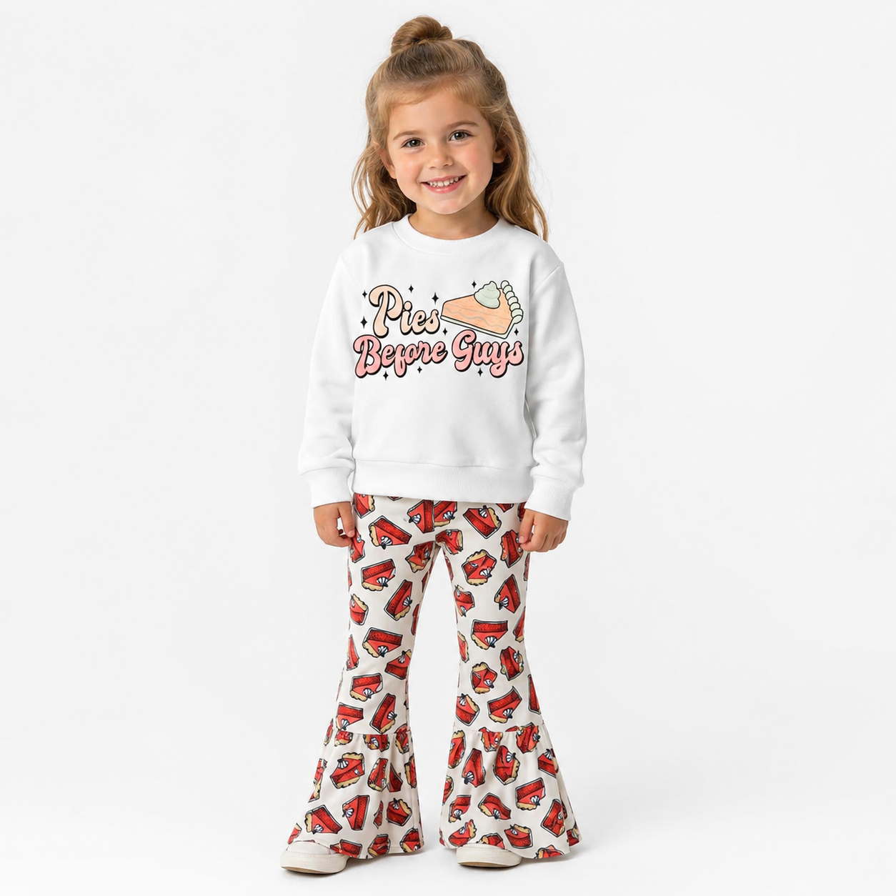 Girls two piece cotton outfit with matching pie print flare pants flat lay