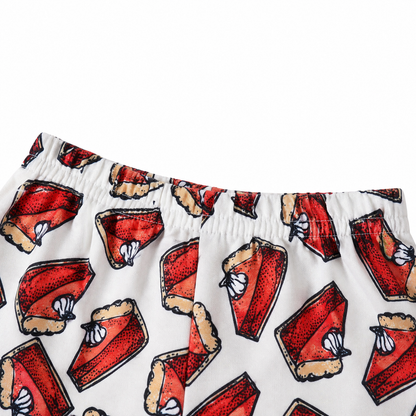 Toddler girl wearing pie print flare pants matching outfit