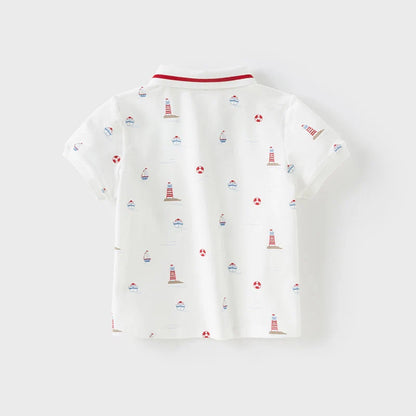 Back view of the white nautical boys polo shirt with an all-over coastal print.
