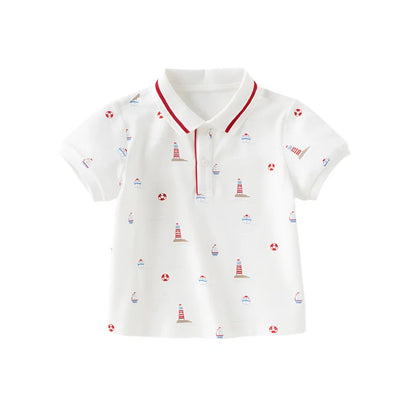 Front view of a white nautical boys polo shirt with lighthouse, sailboat and life ring prints.