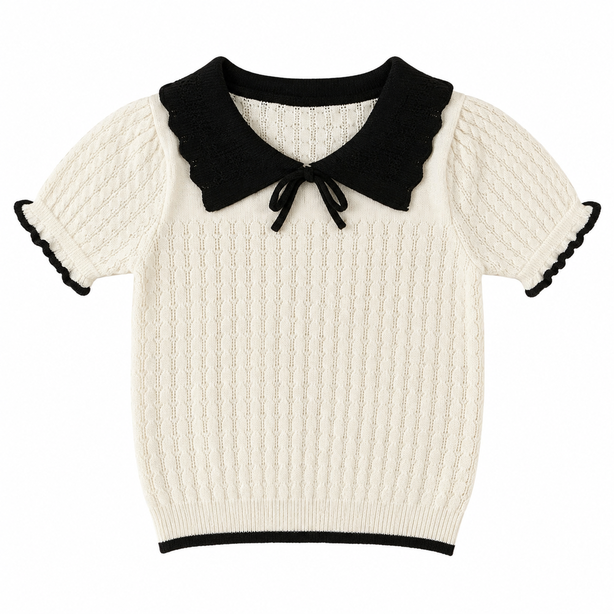 Front flat lay of an ivory girls knit top with a black bow collar and short sleeves.