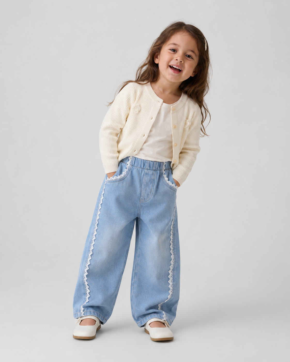 Girl model wearing the light blue barrel denim jeans with lace trim.