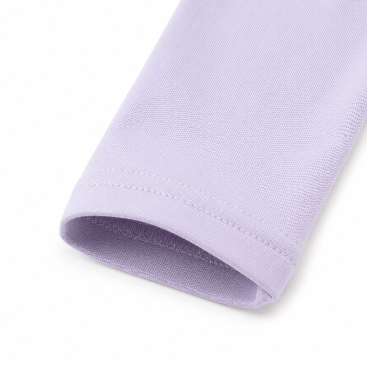 Close-up of the long sleeve cuff stitching on the Lavender girls cotton top.