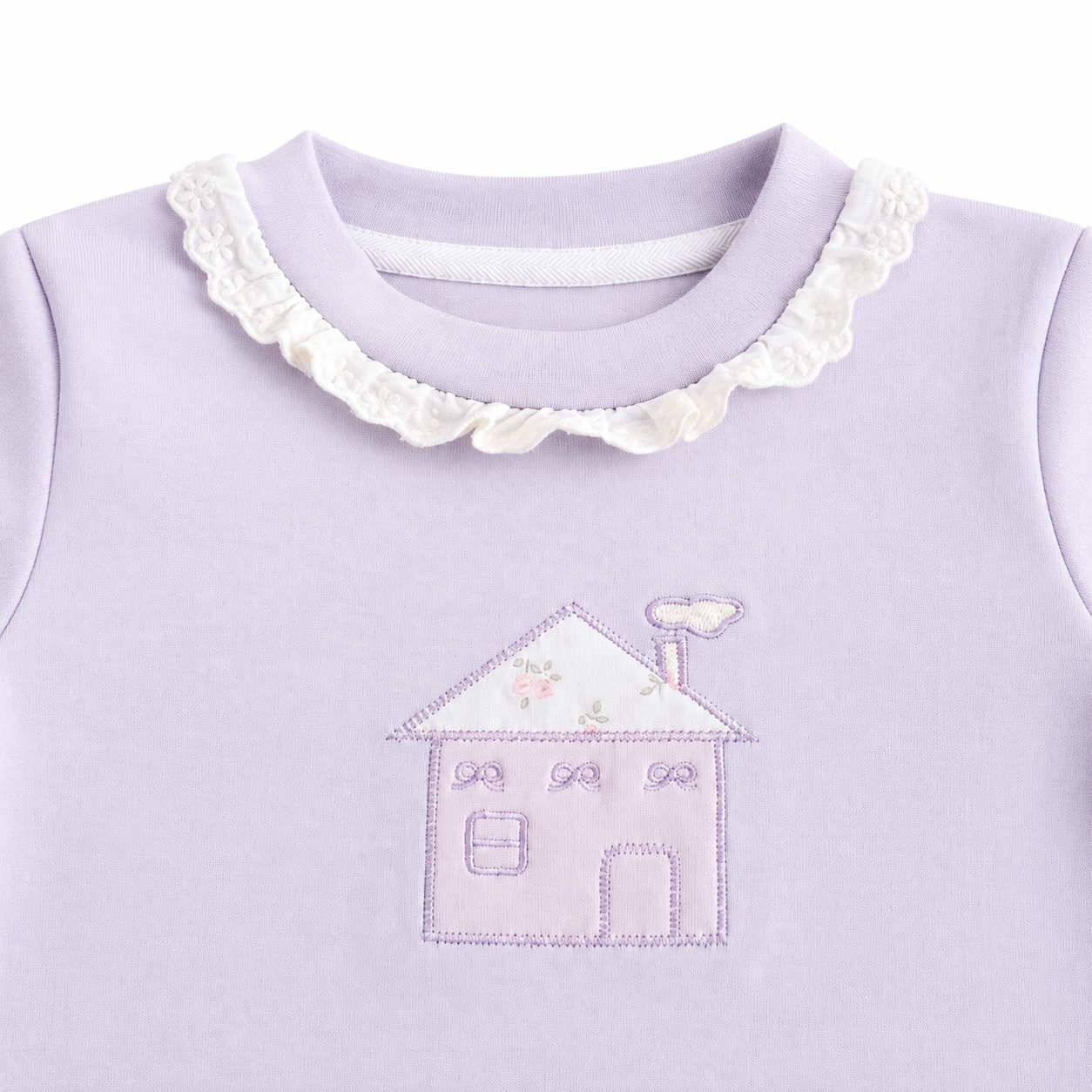 Close-up of the cotton fabric and construction detail on the Lavender girls long sleeve top.