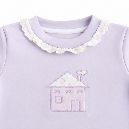 Close-up of the cotton fabric and construction detail on the Lavender girls long sleeve top.