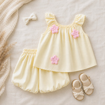 Lila Bloom Set in soft yellow featuring a floral sleeveless top and matching bloomer shorts.