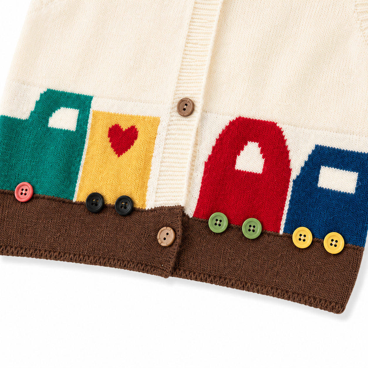 Close-up of the colorful vehicle motif and button-wheel details on the ivory brown kids knit vest.