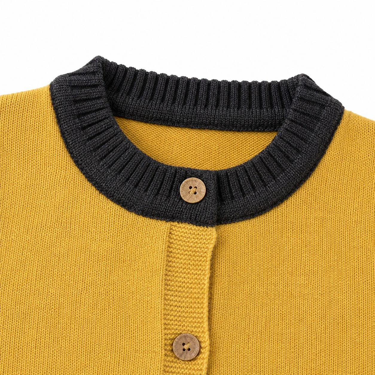 Close-up of the ribbed round neckline and button-front detail on the mustard navy kids knit vest.