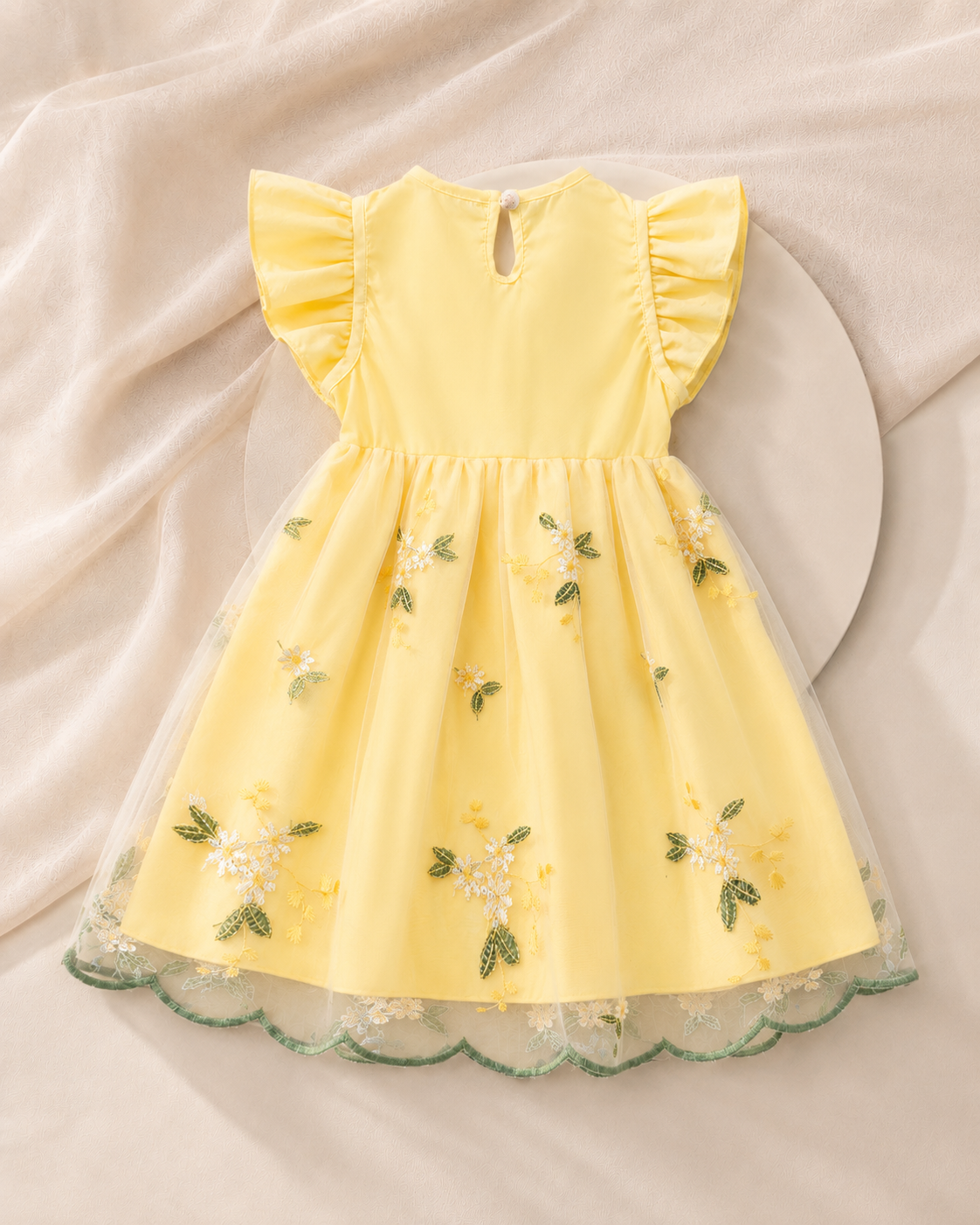 Back view of Lottie Bloom yellow birthday party dress