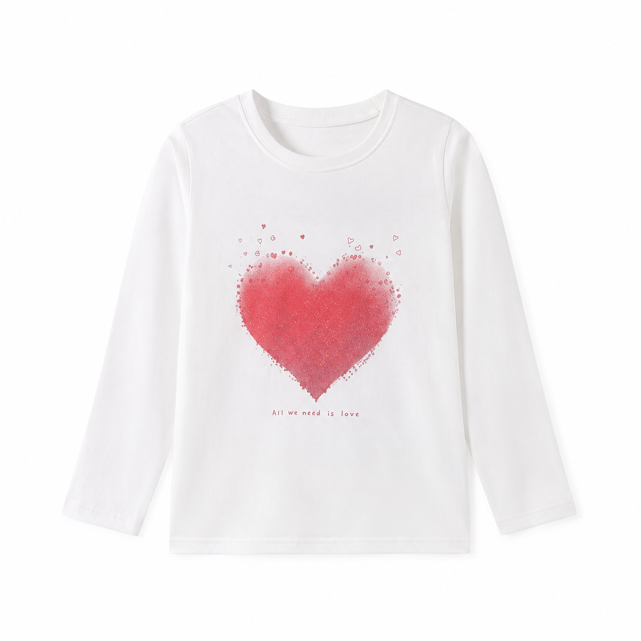 Front flat lay of the white girls cotton long sleeve tee with a red heart graphic.