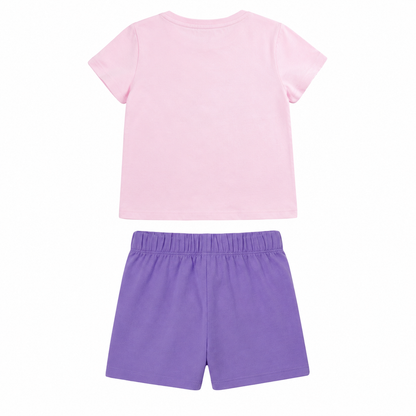 Back flat lay of the pink T-shirt and purple shorts girls two piece set.