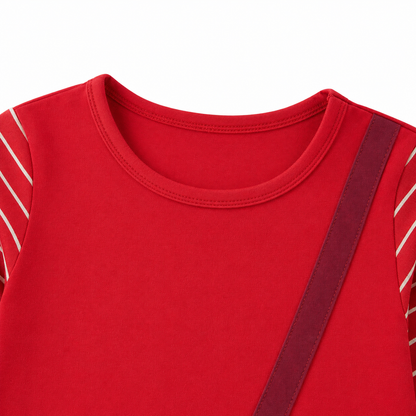 Close-up of the neckline and upper bodice on the red girls Christmas dress.