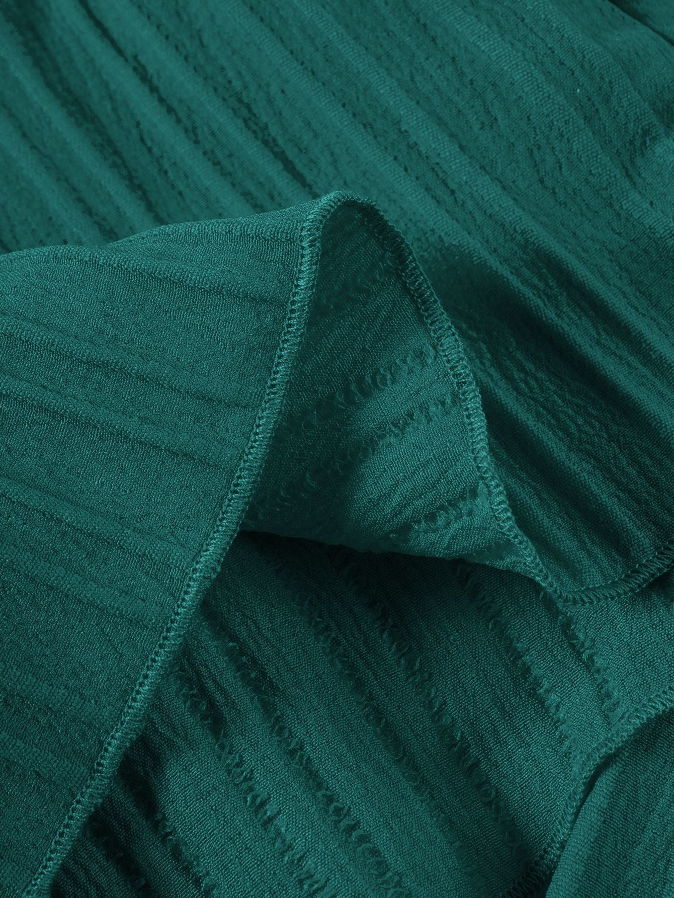 Ribbed fabric detail on Mila Breeze deep teal toddler girls two-piece set