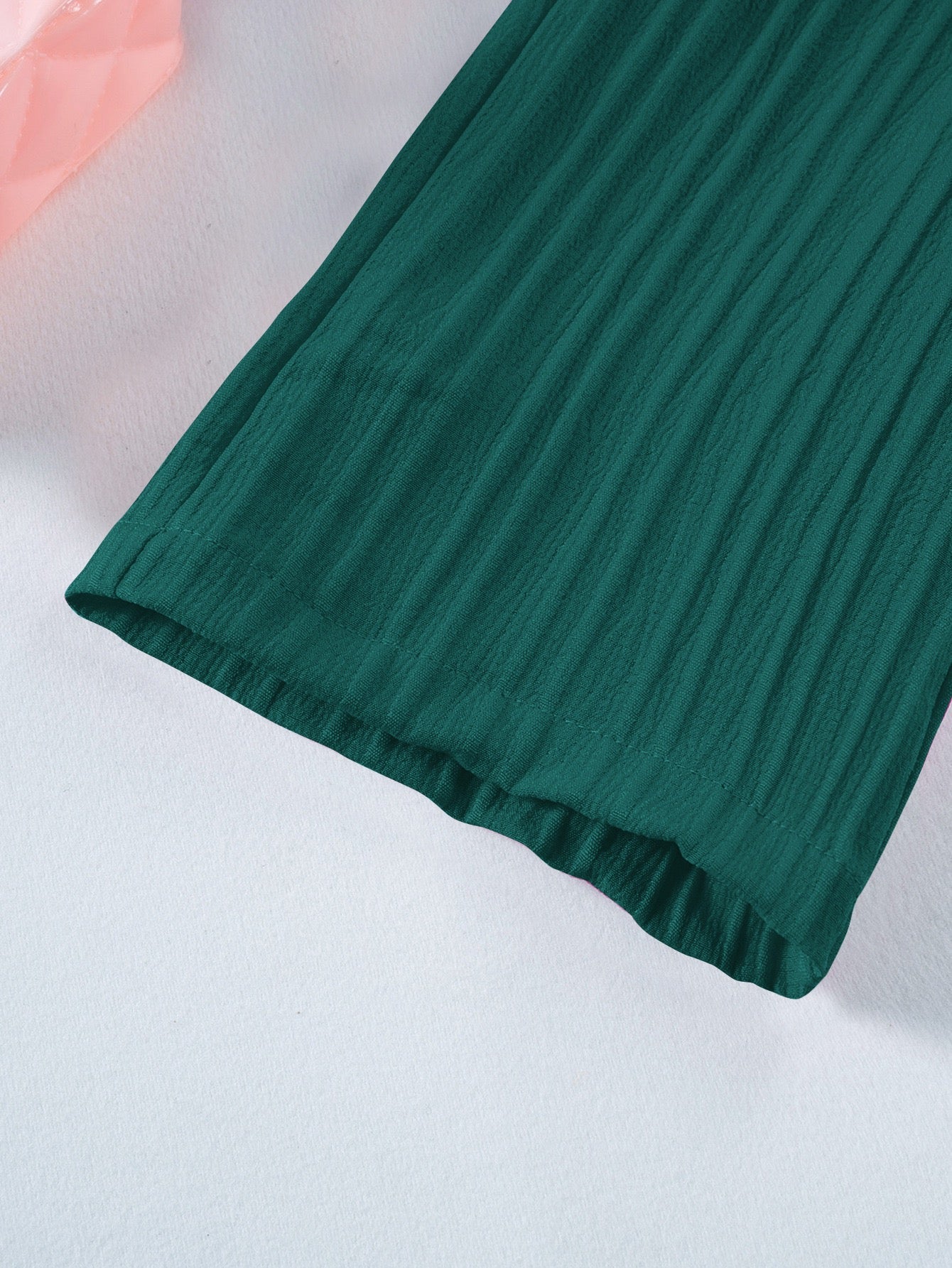 Hem detail on Mila Breeze deep teal toddler girls wide-leg pants