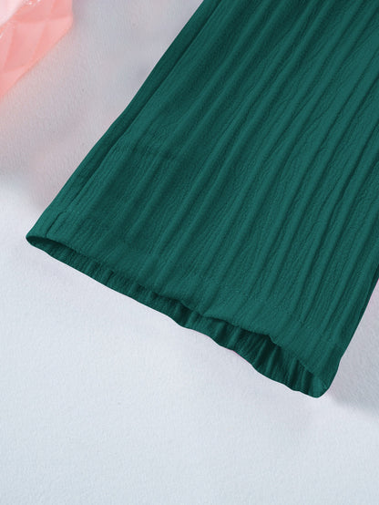 Hem detail on Mila Breeze deep teal toddler girls wide-leg pants