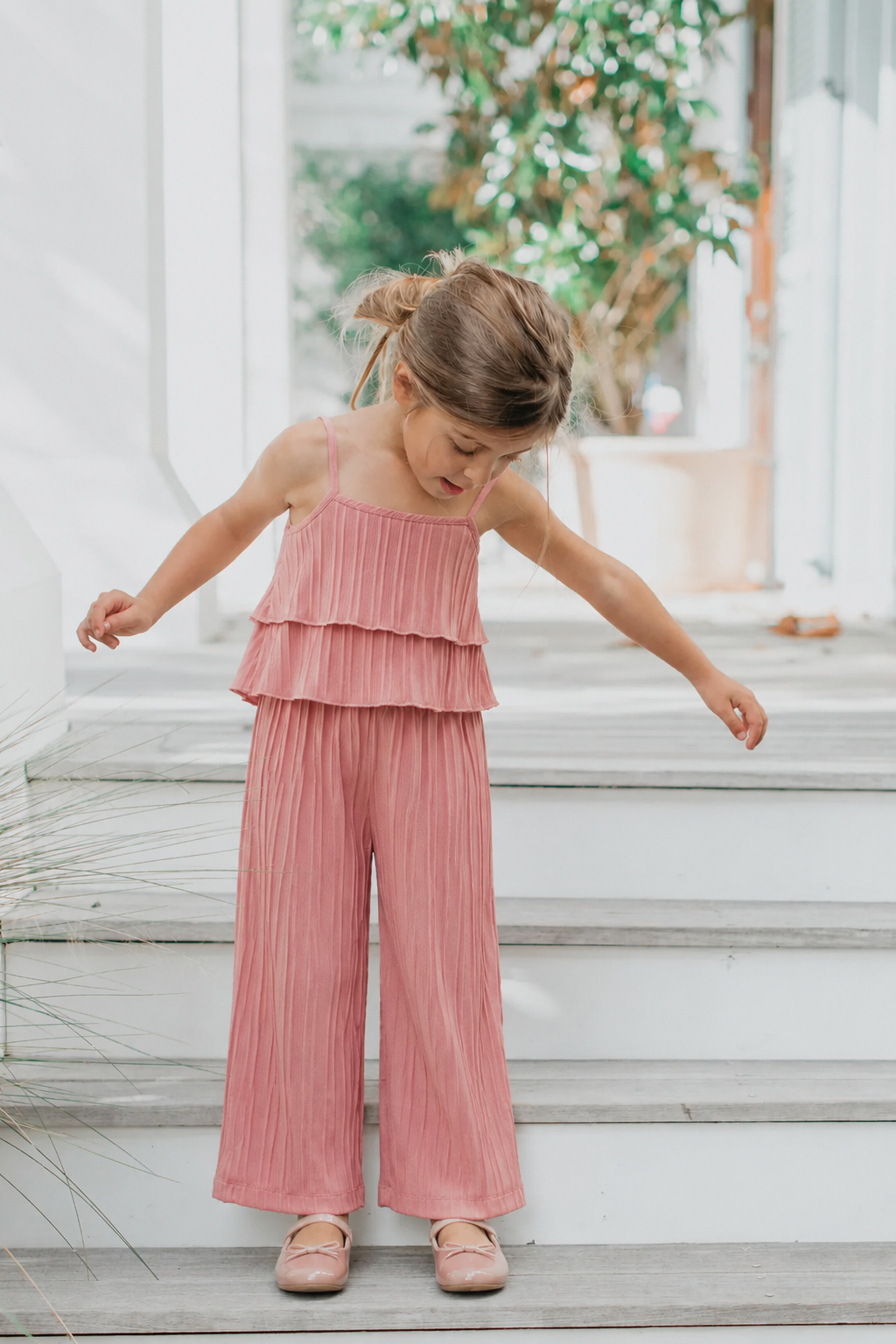 Toddler girl wearing the Mila Breeze dusty rose pink ruffle cami wide-leg pants set