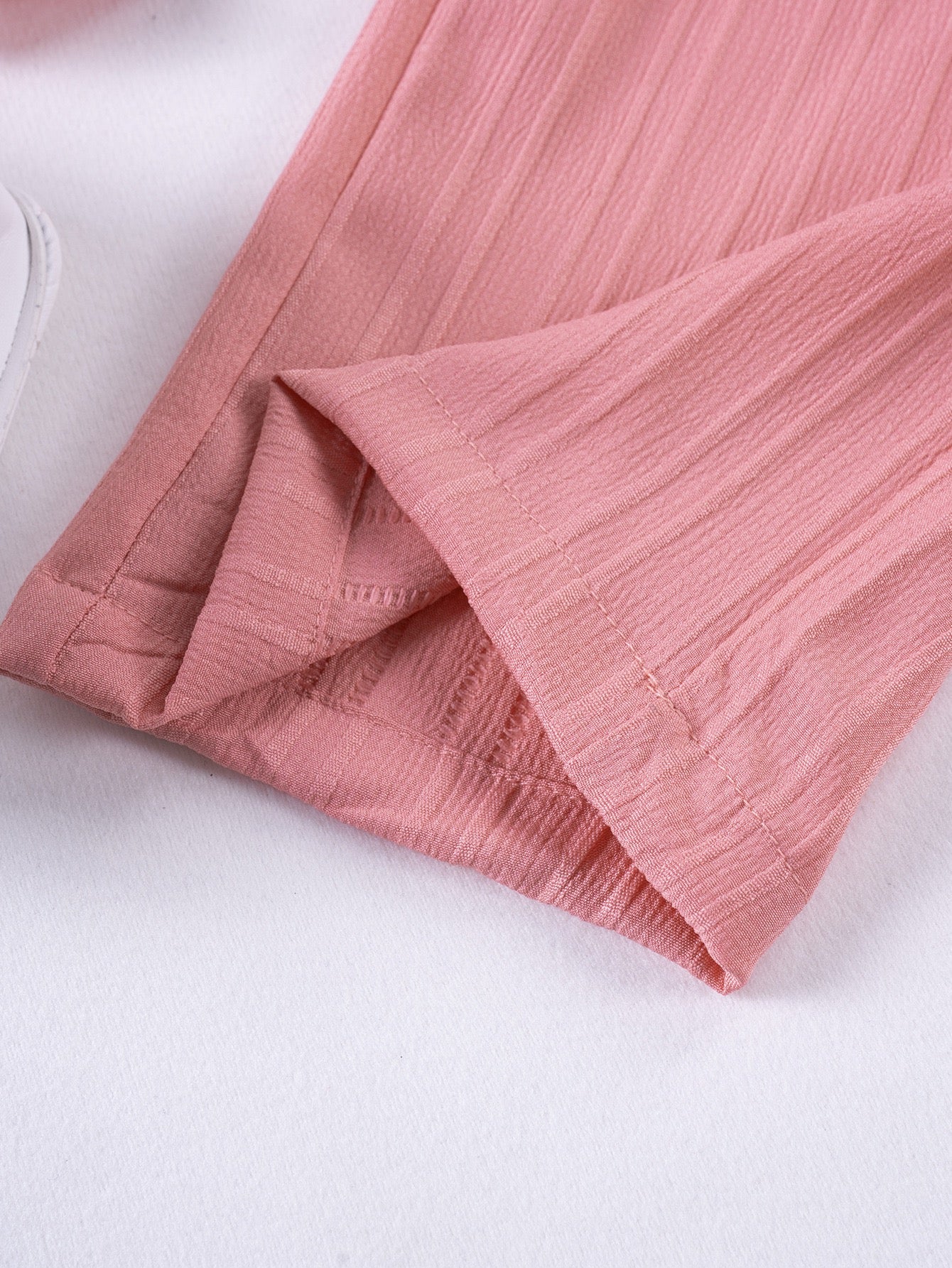 Hem detail on Mila Breeze dusty rose pink toddler girls wide-leg pants