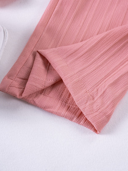 Hem detail on Mila Breeze dusty rose pink toddler girls wide-leg pants