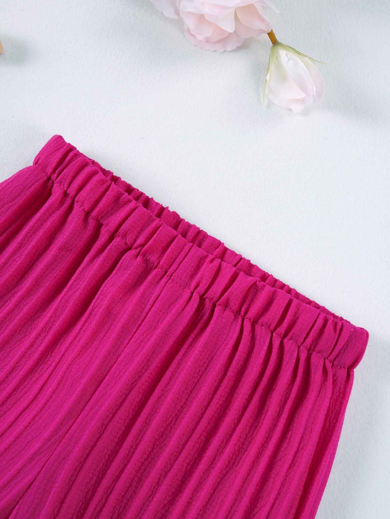 Elastic waist detail on Mila Breeze fuchsia pink wide-leg pants