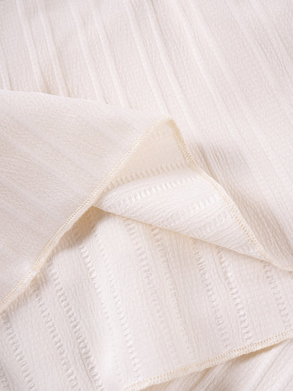 Ribbed fabric detail on Mila Breeze ivory cream toddler girls two-piece set