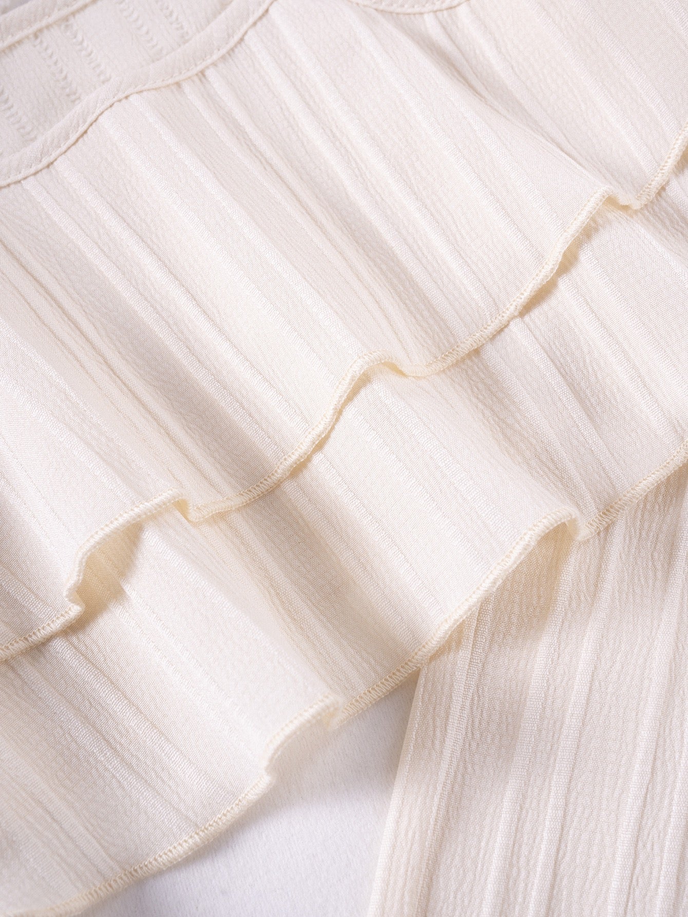 Ruffle top detail on Mila Breeze ivory cream toddler girls two-piece set