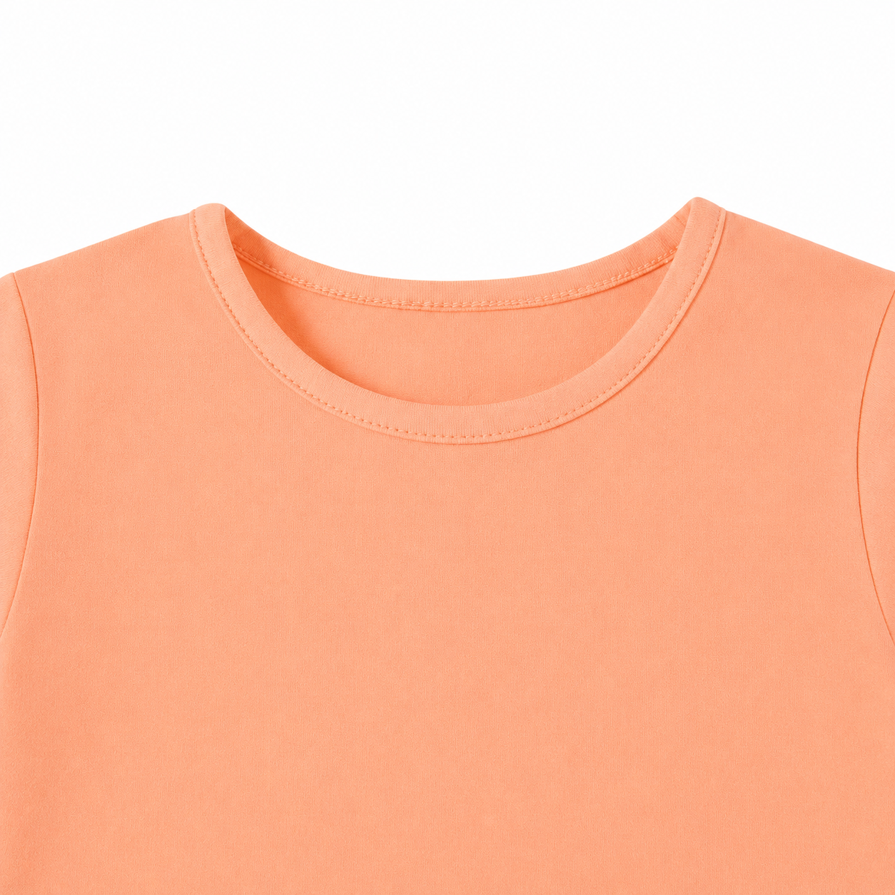 Close-up of the crew neckline on the peach kids long sleeve tee.