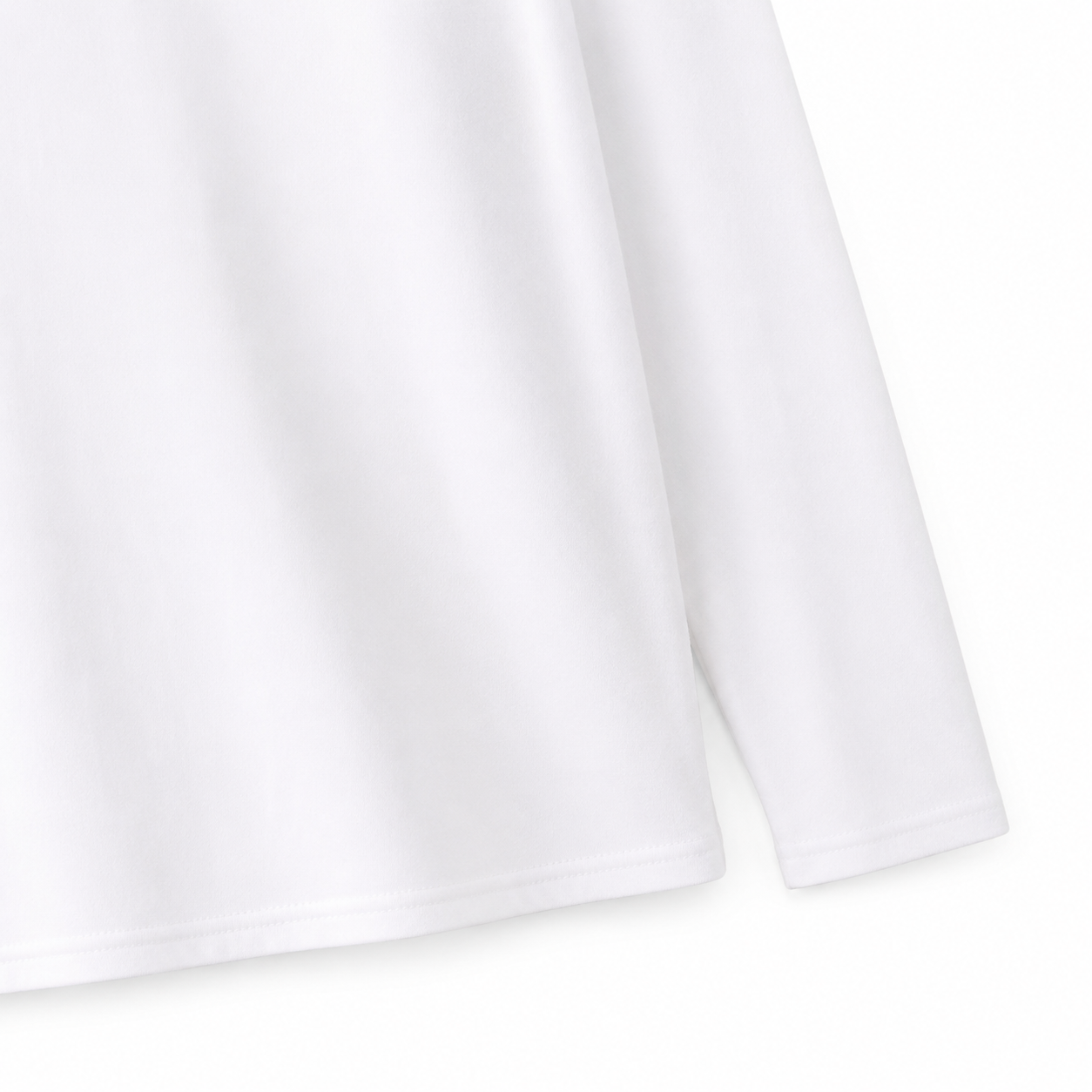 Close-up of the shoulder seam and cotton fabric on the white kids tee.