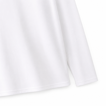Close-up of the shoulder seam and cotton fabric on the white kids tee.