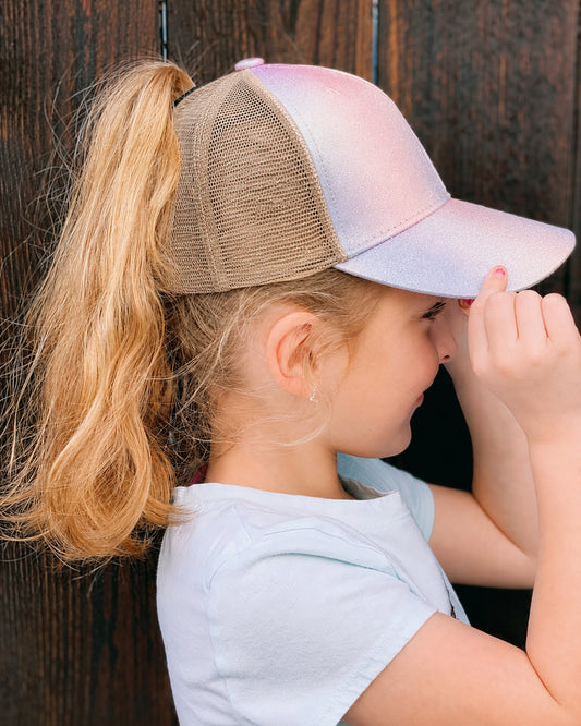 pastel-glow-ponytail-trucker-hat-girl-model-side-view.jpg