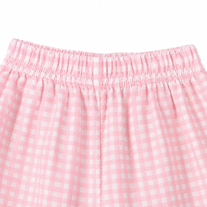 Pink gingham girls cotton pants elastic waistband close-up