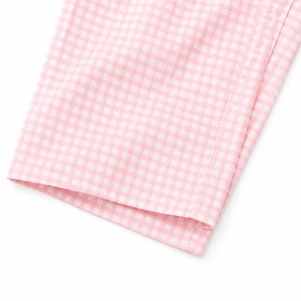 Pink gingham girls pants cropped wide-leg hem detail