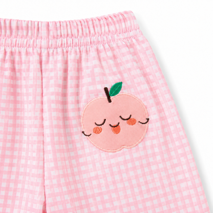 Pink gingham girls pants peach patch close-up