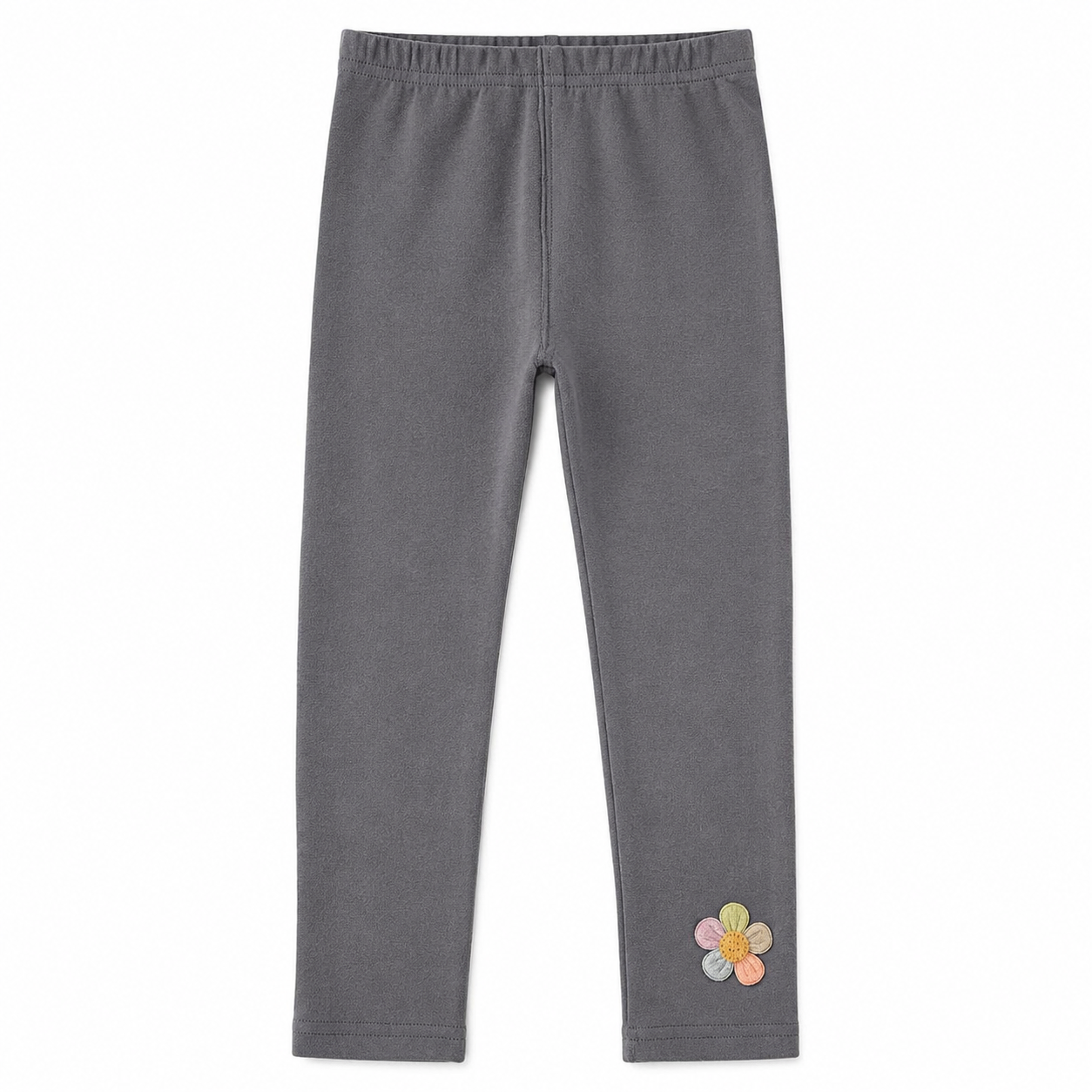 Front flat lay of the charcoal gray girls cotton leggings with small flower detail near the hem.