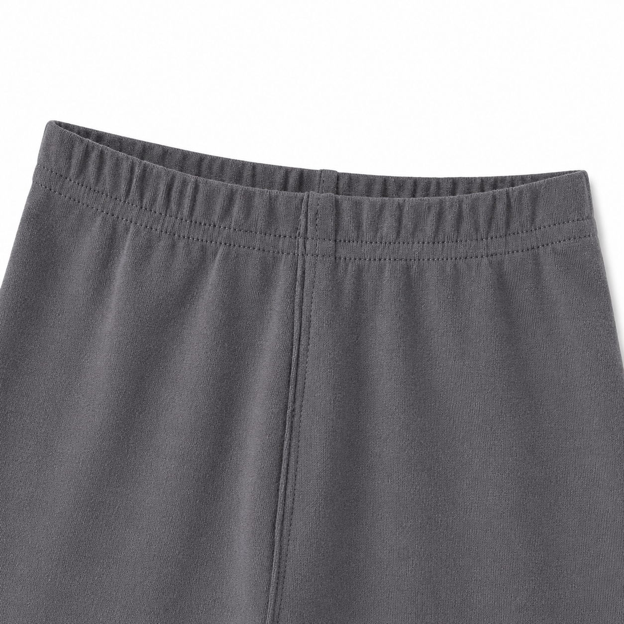 Close-up of the cotton fabric and seam detail on the charcoal gray leggings.