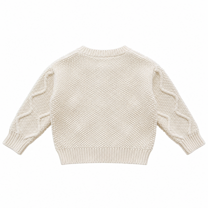 Back flat lay of the ivory girls cable knit cardigan showing the knit texture and ribbed hem.