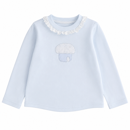 Front flat lay of the Powder Blue girls cotton long sleeve top with ruffle collar and mushroom embroidery on a white background.