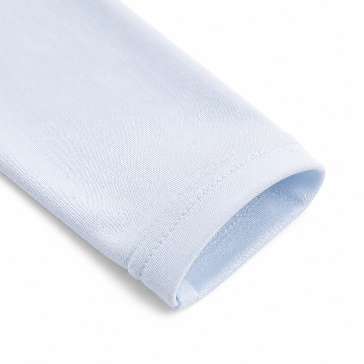 Close-up of the long sleeve cuff stitching on the Powder Blue girls cotton top.