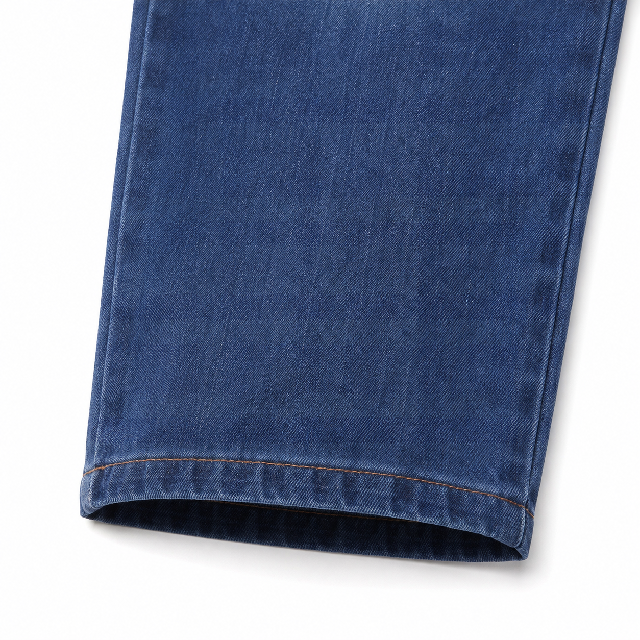 Close-up of the straight-leg hem on the medium blue kids jeans.