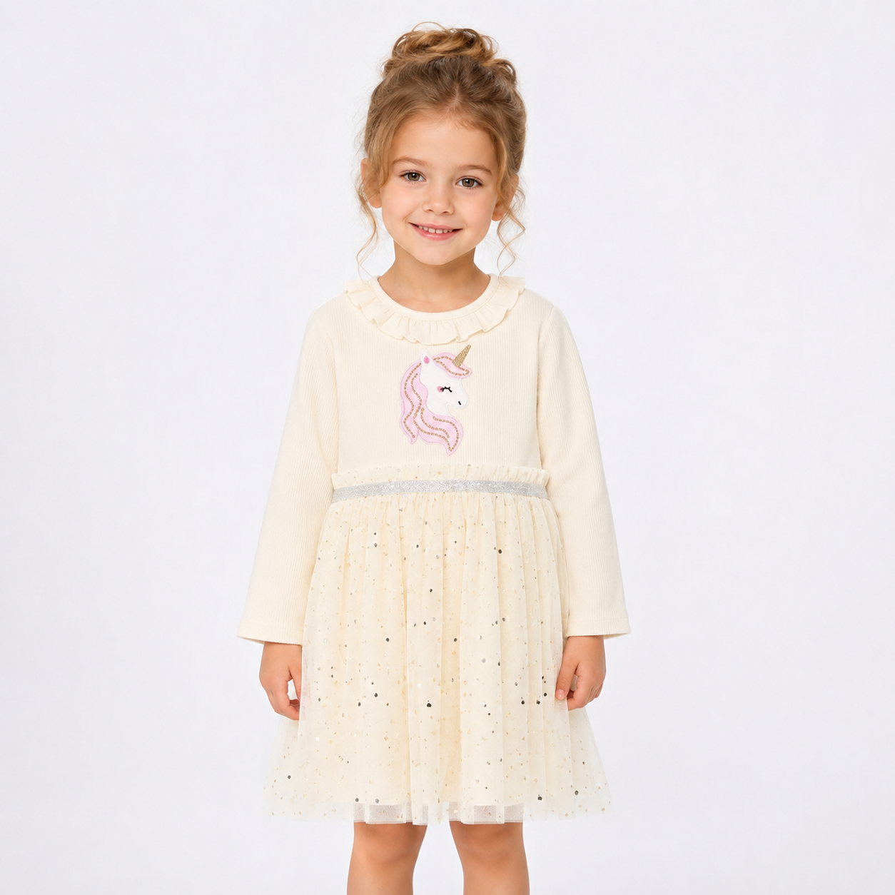 Girl model wearing the ivory unicorn long sleeve tulle dress.
